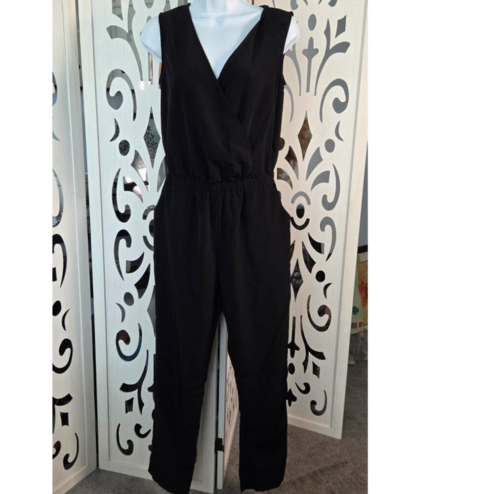 One Clothing Black Sleeveless Jumpsuit Small Surplice Pocket Tapered Leg